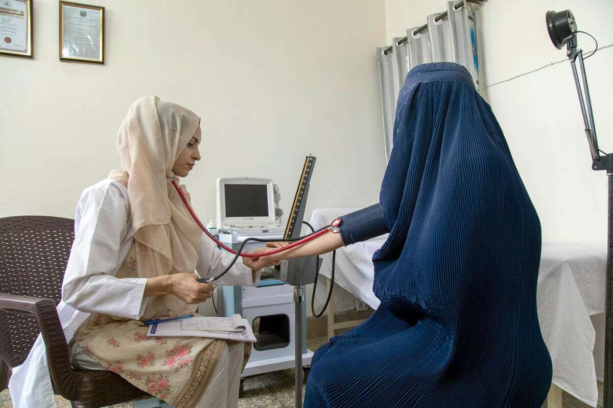 Pakistan. Trailblazing refugee doctor serves women in her community