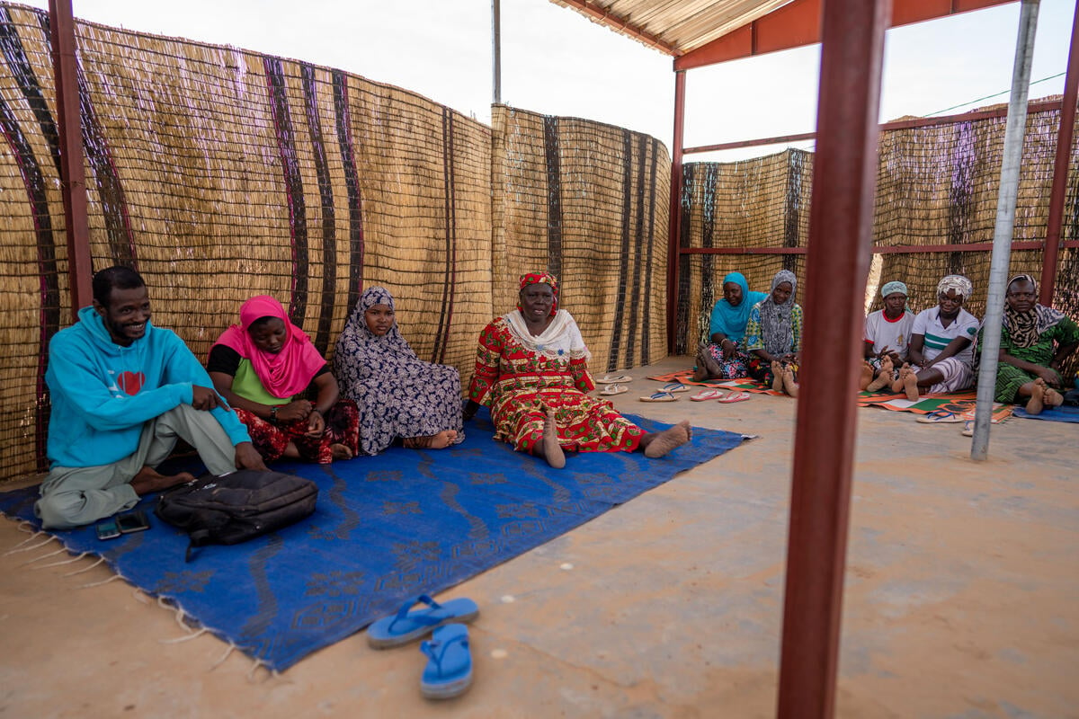 Burkina Faso. Community mobilizer Roukiatou Maiga teaches about early marriage