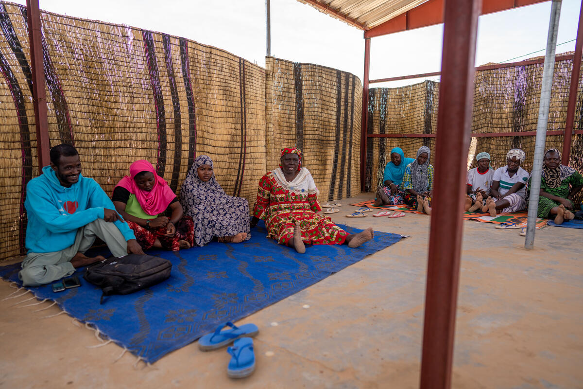 Burkina Faso. Community mobilizer Roukiatou Maiga teaches about early marriage