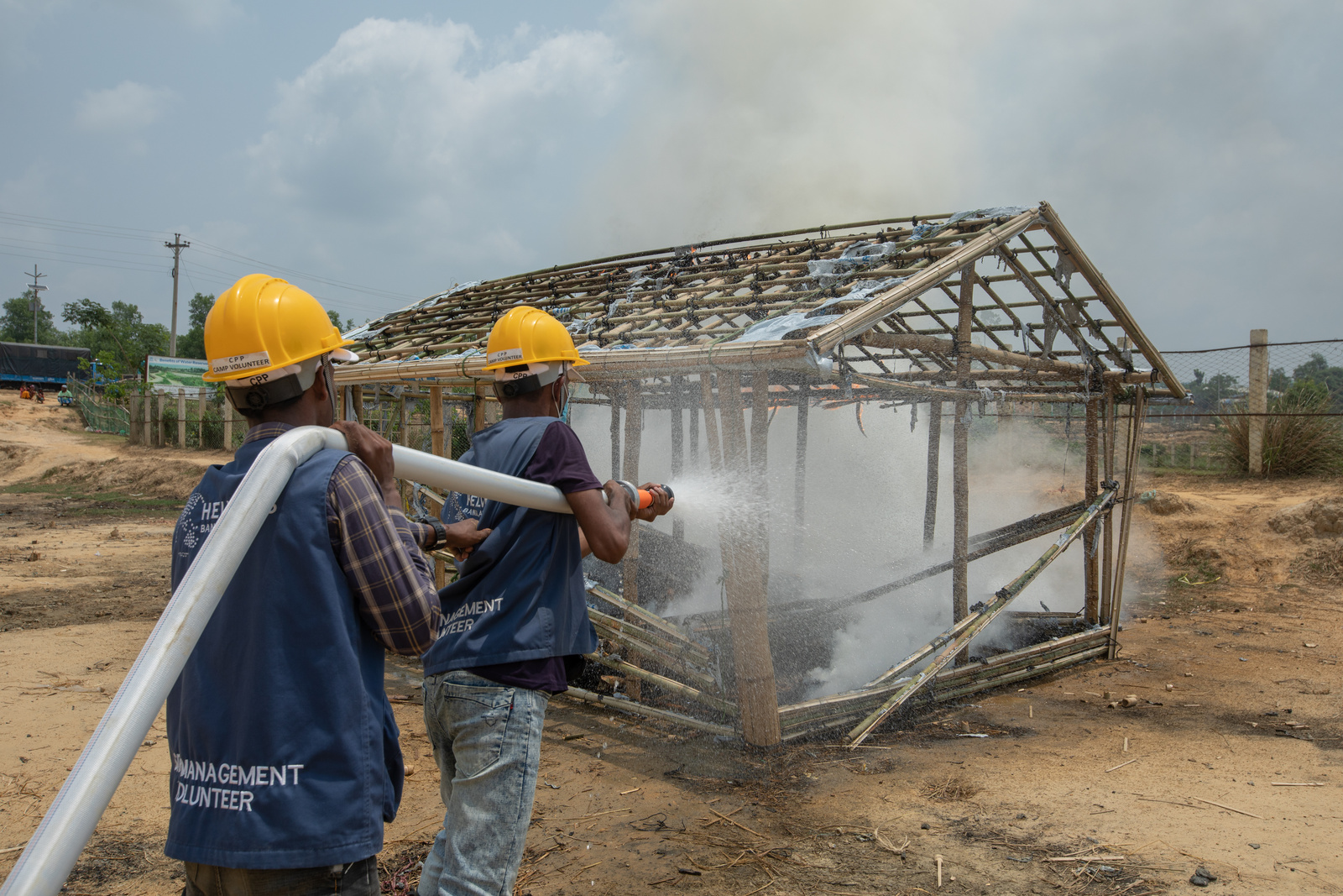 Bangladesh. Refugee volunteers receiving training on how to control fires that break out in shelters