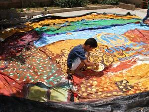 The artwork on this tent was inspired by the Austrian symbolist painter Gustav Klimt and the Syrian poet Nizar Qabbani.