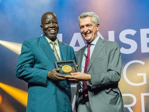 UN High Commissioner for Refugees, Filippo Grandi, presents the 2018 Nansen Refugee Award to Dr. Evan Atar Adaha, a surgeon and medical director at a hospital in north-eastern South Sudan.