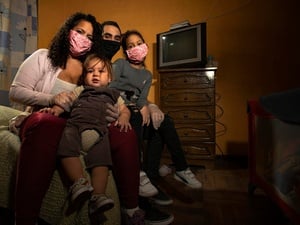 A displaced Venezuelan family who lost their income during COVID-19 pictured in their home in Santiago, Chile, in May 2020.
