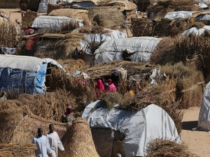 Nigeria. Thatched homes at the Muna Internally displace peoples camp in Maiduguri, Nigeria