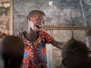 Six-year-old Gambolipai Martha leads the other children in a song during a pre-school class at Makpandu refugee settlement in South Sudan. Some 400 students, including local South Sudanese children and Congolese and Sudanese refugees, attend the school which was founded in 2019 by refugee community group, the Youth Association for Peace and Development. 