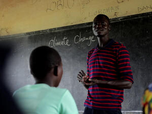 Uganda. South Sudanese refugee plants trees in Uganda to beat climate change