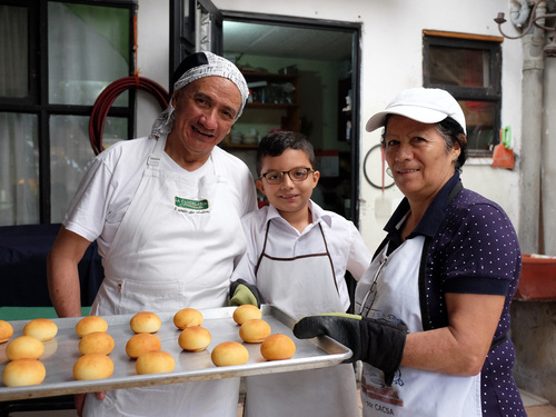 The Ángel Velásquez family – from left, Ricardo, Sebastián and Miriam – prepare bread at the family's bakery in San José, Costa Rica.