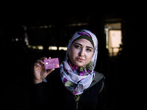 Lebanon. ATM cards during cash distribution