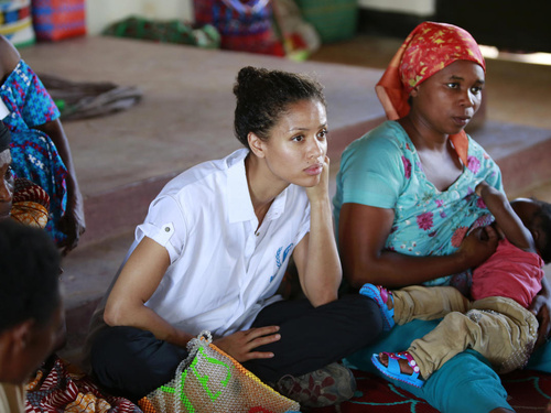 Uganda. UNHCR Supporter Gugu Mbatha-Raw at the Women's Centre in Nakivale Refugee Settlement, with Sifa Semeki, a refugee.