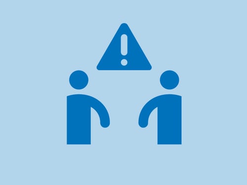 An icon of two people with a warning sign