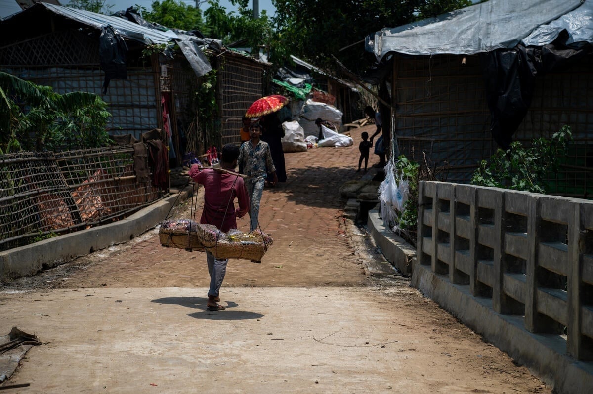 A vendor walks through one of the camps in Teknaf, Cox’s Bazar.