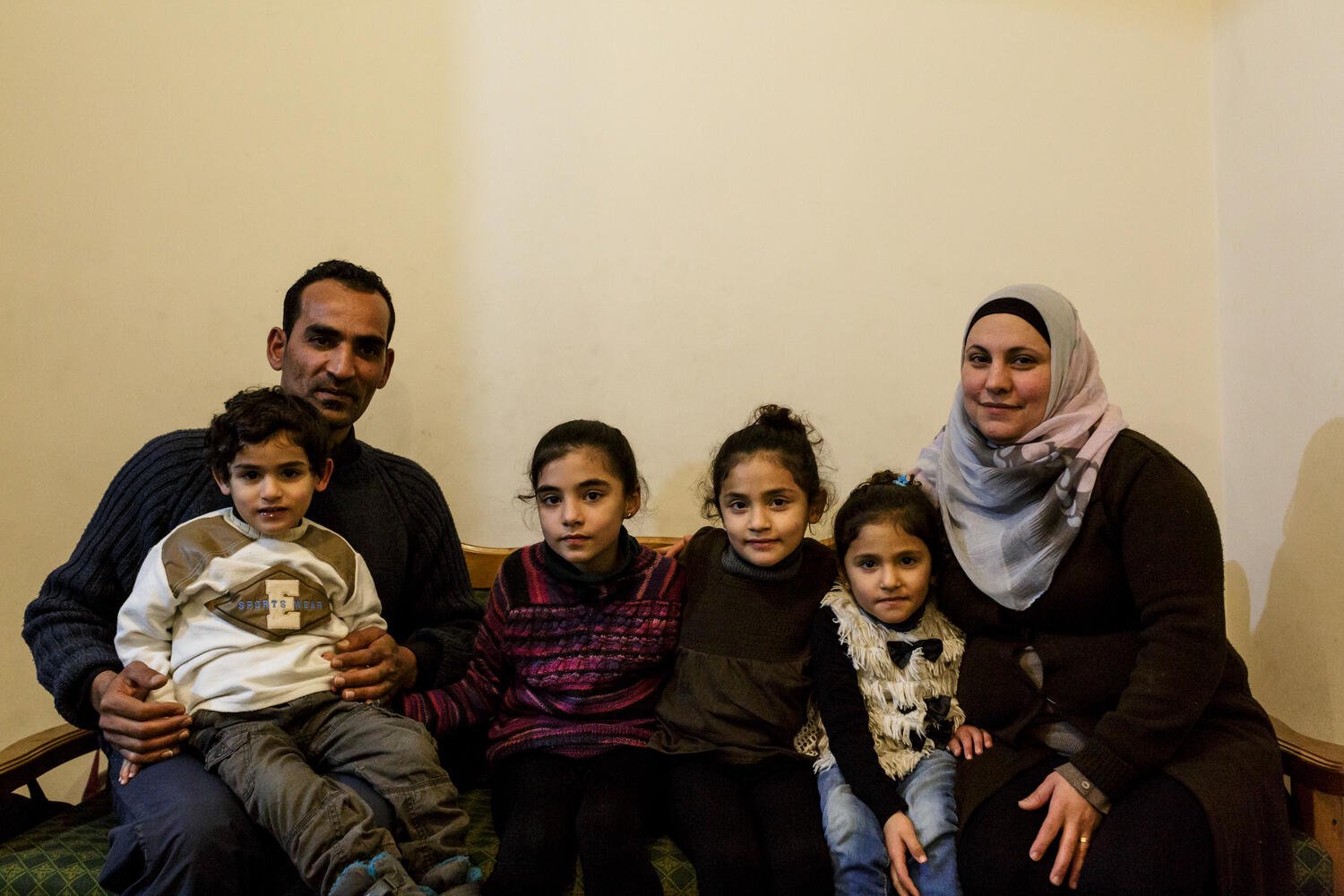 Greece. The Syrian electrician installing power at Lesbos refugee camp
