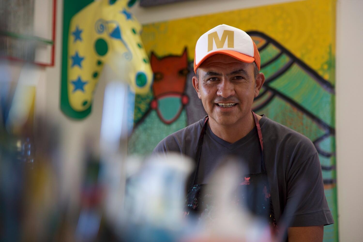 Argentina. Artist helps Syrian couple start over