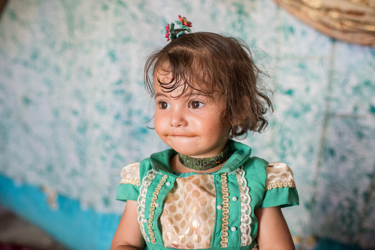 Iraq. People adjusting to life after losing their husbands and fathers.