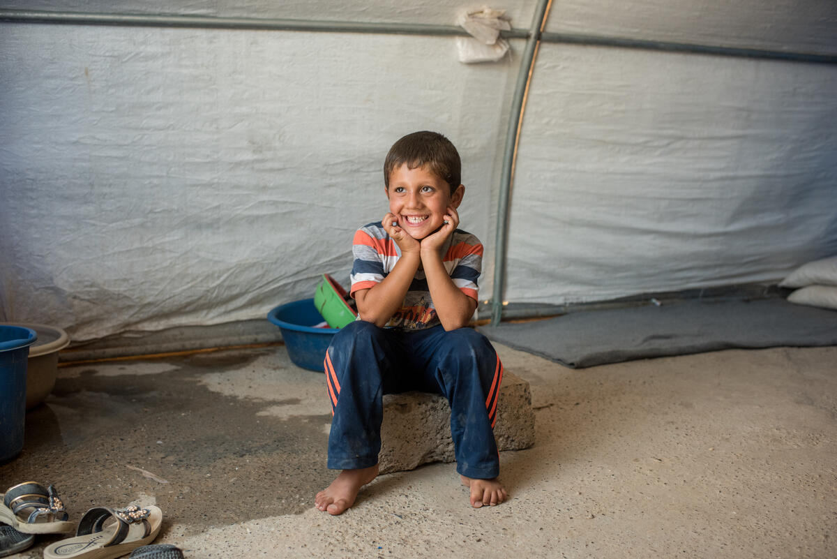 Iraq. People adjusting to life after losing their husbands and fathers.