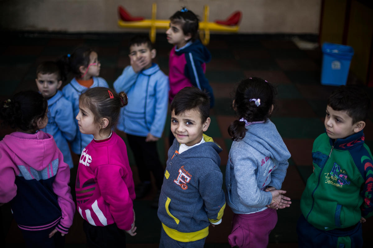 Mohammad, a young Syrian refugee from the ancient desert city of Palmyra, stands in a row during a break at the Father Andeweg Institute for the Deaf (FAID) on the outskirts of Beirut in Lebanon.