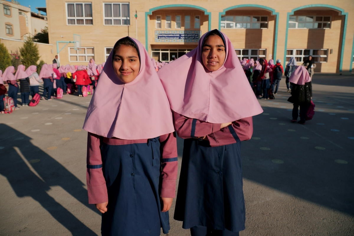 Iran. Afghan refugee sisters go to school for the first time