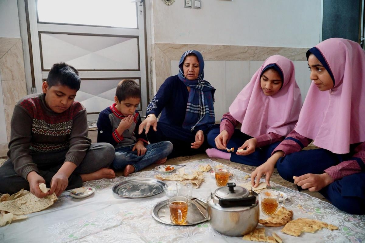 Iran. Afghan refugee sisters go to school for the first time