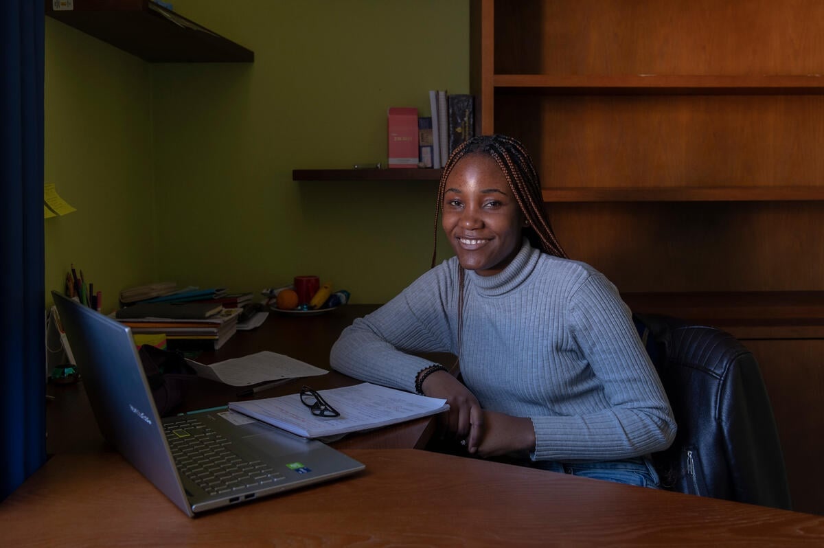 Italy. Bernice Kula-Kula studying in her room at the halls of residence