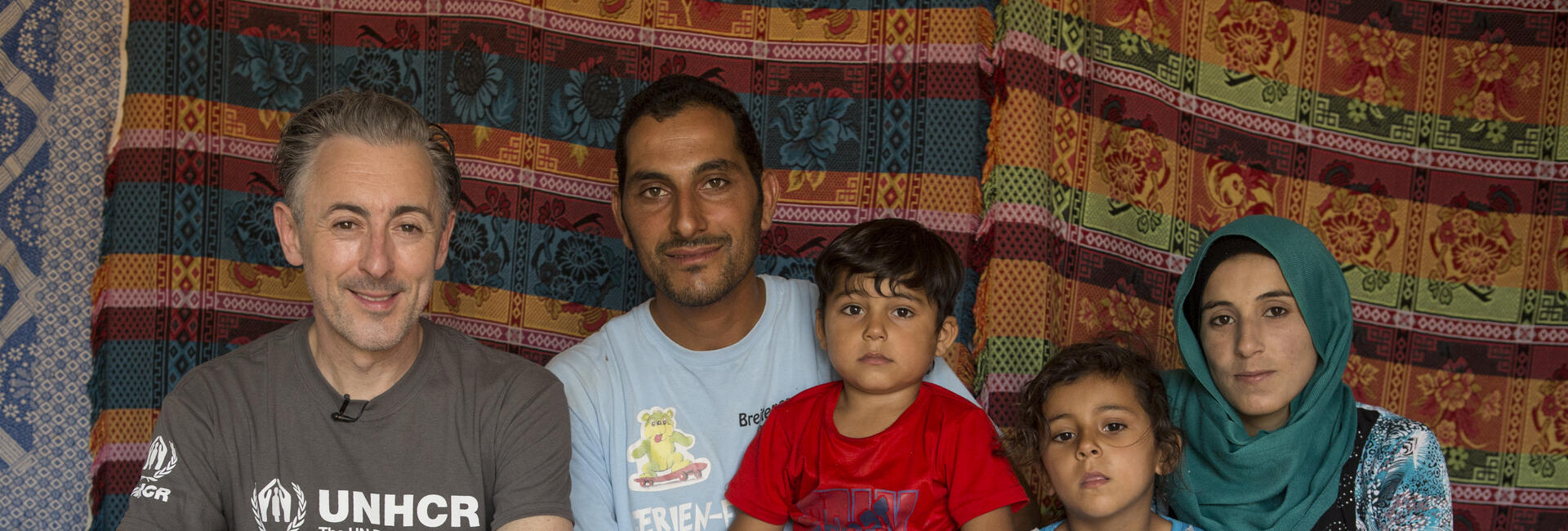 Lebanon. UNHCR High Profile Supporter Alan Cumming meets Syrian refugee Mzyed Haj Khalaf and his family at Rass Maska informal settlement