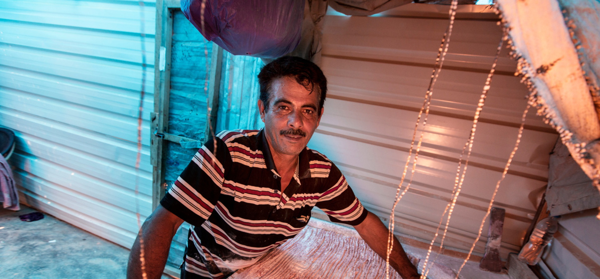 Jordan. Syrian sweet maker serves up a taste of home