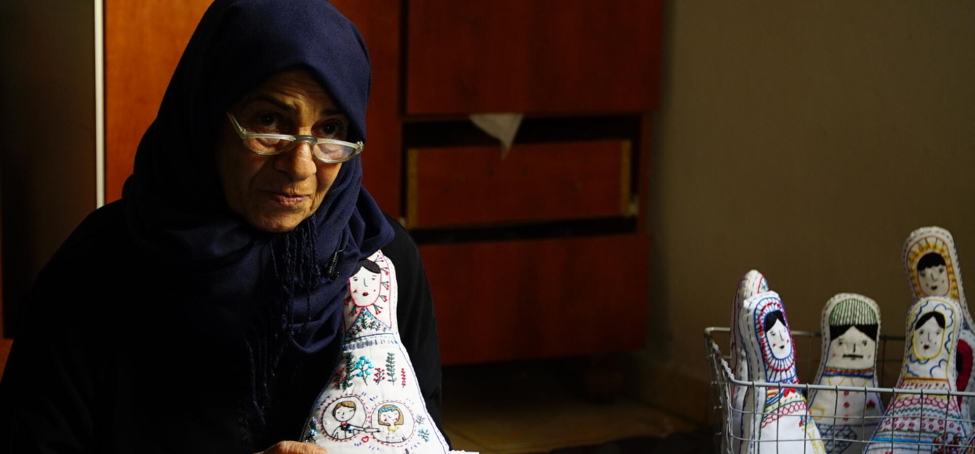 Lebanon. Embroiding dreams and hopes of Syrian mothers in war-torn Aleppo on stuffed dolls