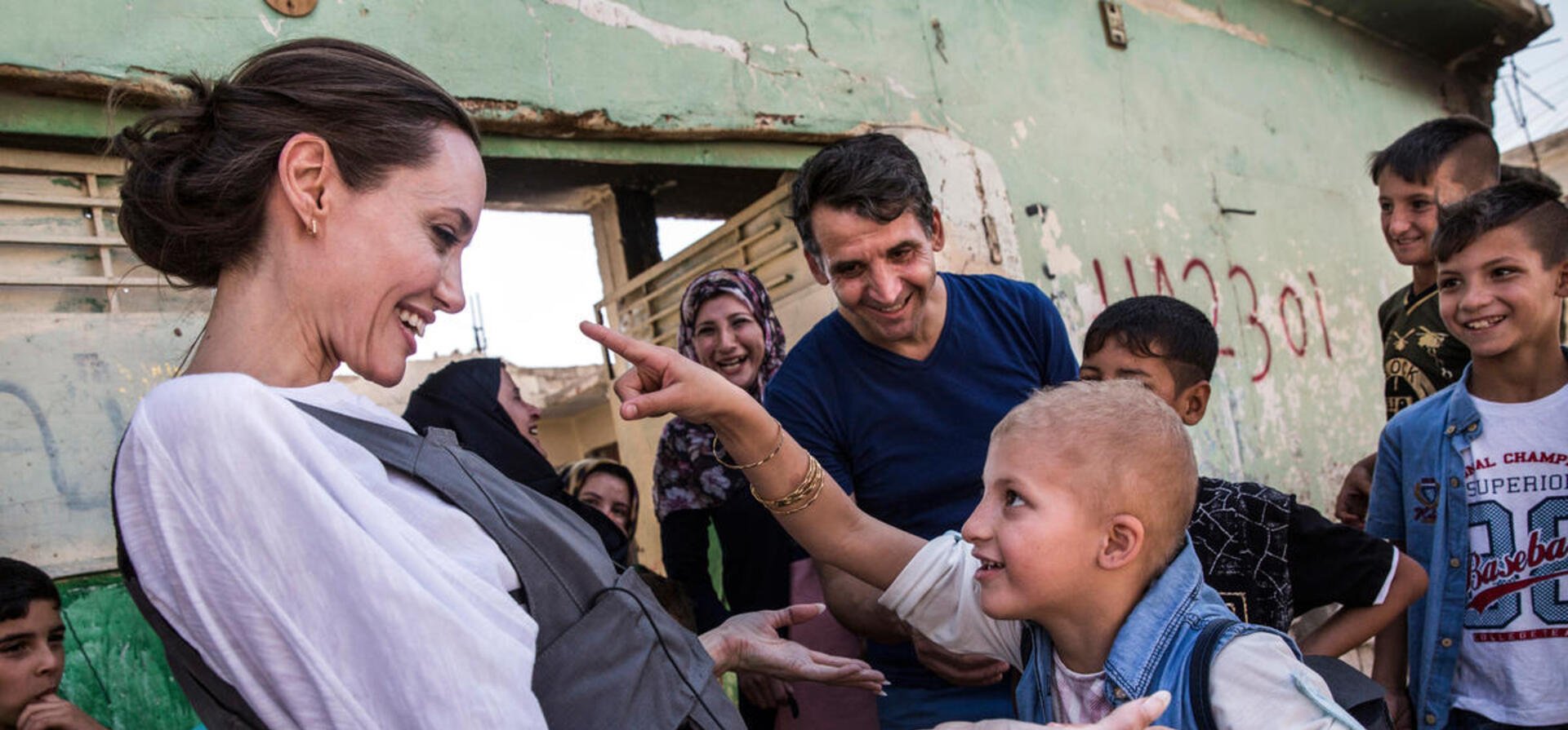 UNHCR Special Envoy Angelina Jolie in Mosul with an eight-year-old girl in West Mosul, Iraq