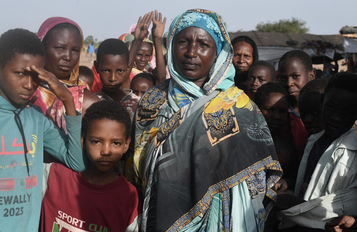Amdafock, CAR. A group of Sudanese refugees pose while waiting to be registered as refugees