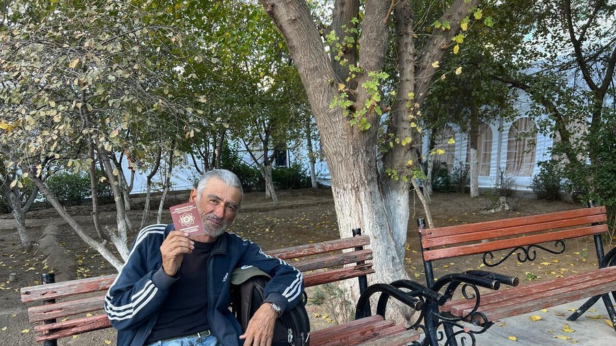 Turkmenistan. Former stateless person showing passport in Ashgabat.
