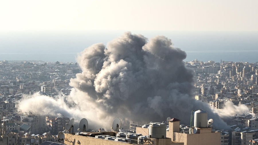 A cloud of smoke caused by the impact of a missile strike is visible over the Haret Hreik neighbourhood of Beirut, Lebanon.