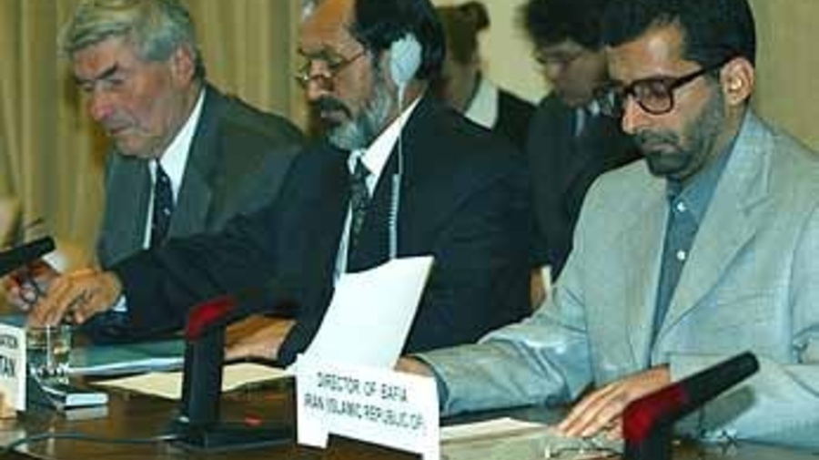 The UN High Commissioner for Refugees, the Afghan Interim Authority's Minister for Repatriation and the Director of the Islamic Republic of Iran's Bureau for Aliens and Foreign Immigration Affairs at the April 3 signing.