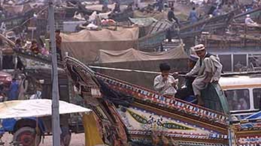 At UNHCR's Takhta Baig registration centre in Pakistan, thousands of Afghan refugees wait for improved security before completing the trip home.
