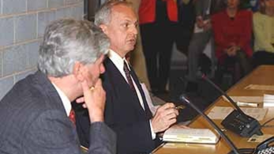 Arthur Helton presents his book to High Commissioner Lubbers (left) and UNHCR staff in Geneva.