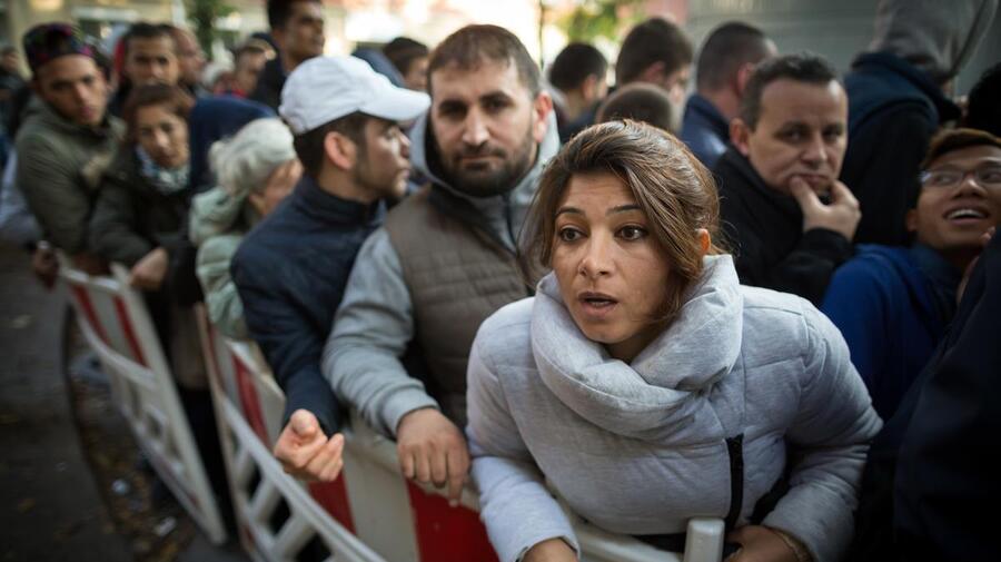 Germany. Refugees hoping to register their presence in Berlin.