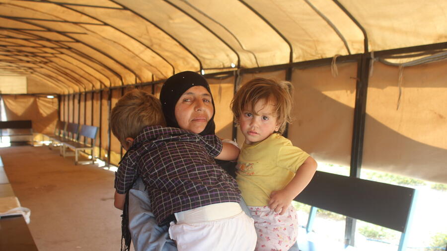 Syria. As fighting surges, a family risk all to flee Ar-Raqqa violence