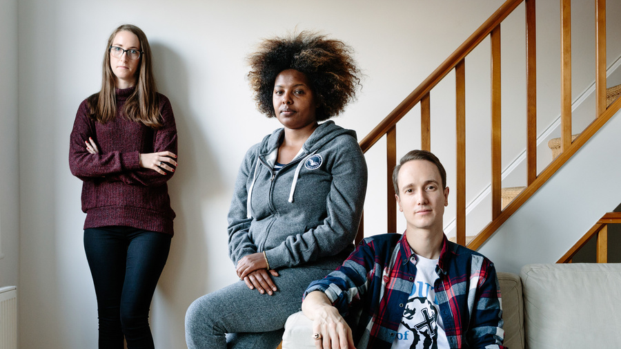 United Kingdom. Sudanese graduate finds a welcoming environment with London couple. This portrait is part of Great British Welcome, the UK chapter of the ongoing No Stranger Place series, which portrays locals and refugees living together in different countries.