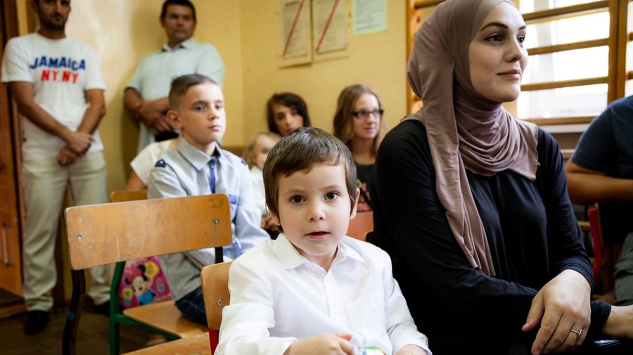 Poland. Chechen children mingle happily in village school