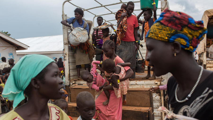 Recently arrived refugees from South Sudan arrive at temporary accommodation provided by UNHCR in Adjumani, northern Uganda.