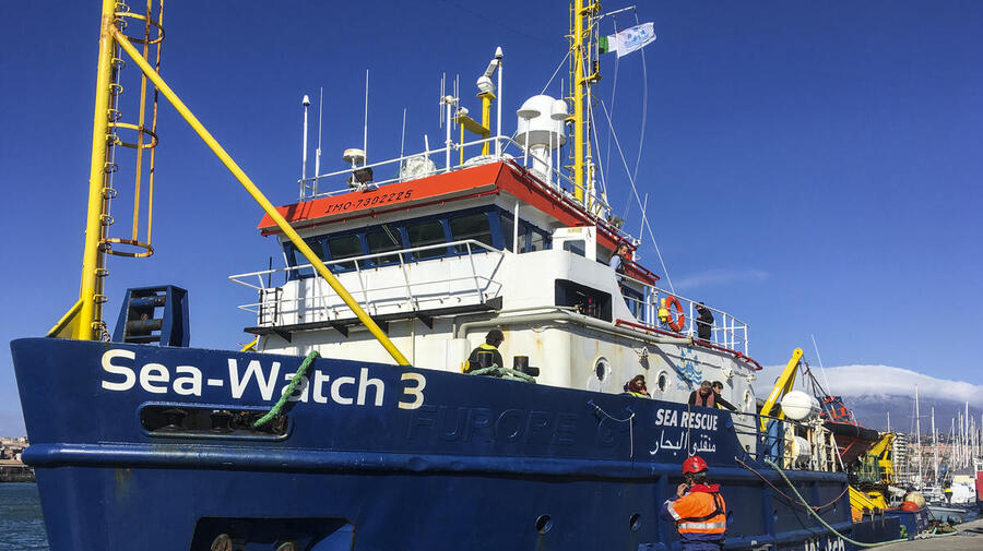 Italy. Rescued refugees and migrants disembark after marathon ordeal