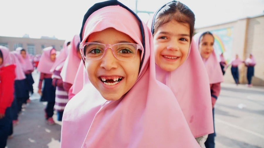 Iran. Afghan refugee sisters go to school for the first time