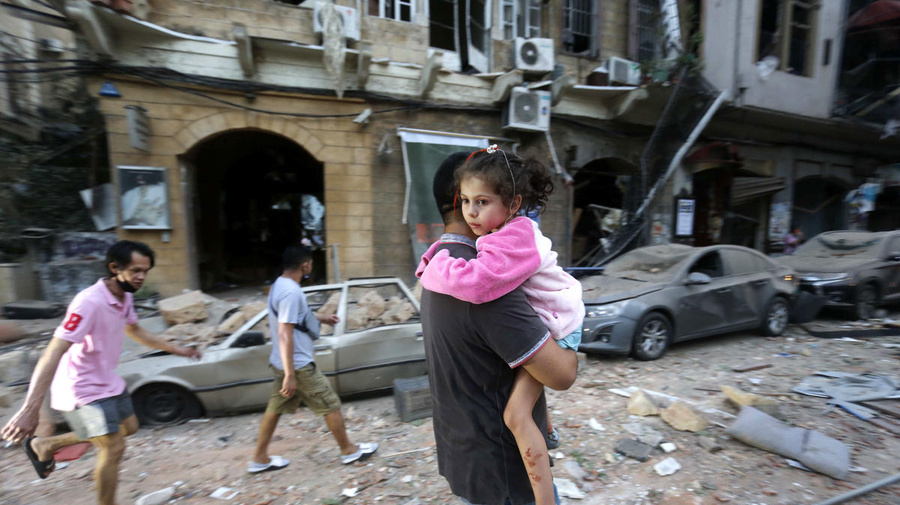 Lebanon. People flee to safety as massive explosion shakes Beirut