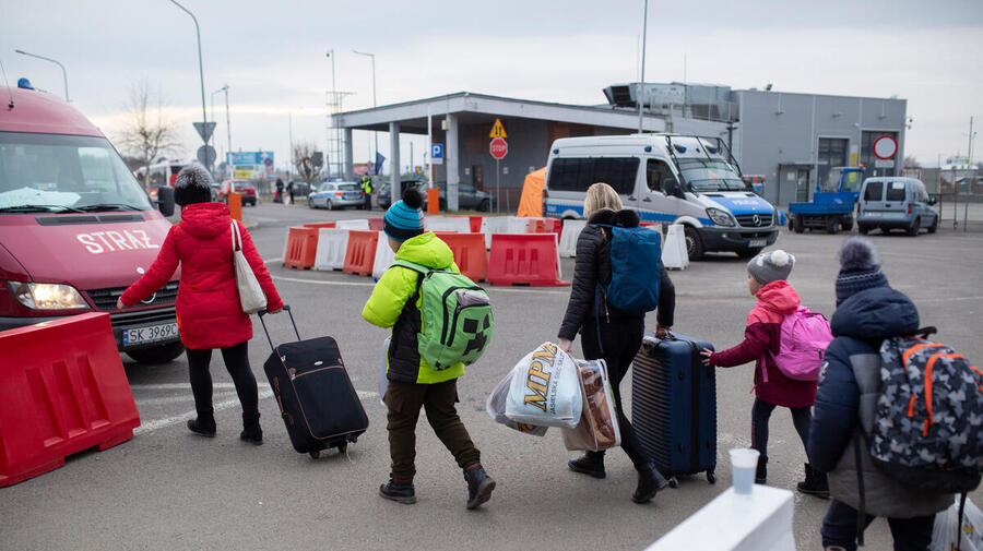 Poland. UNHCR Staff meets refugees from Ukraine crossing into Poland at Medyka border crossing