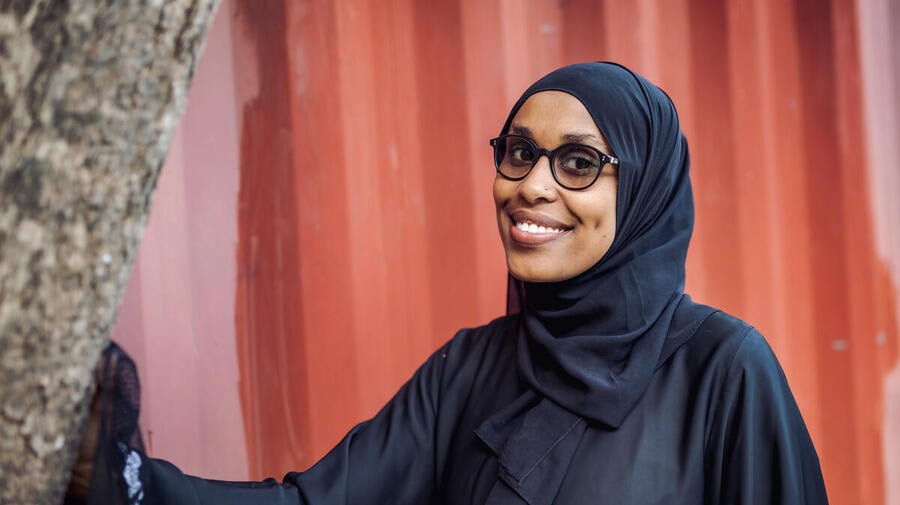 A woman smiles for the camera 