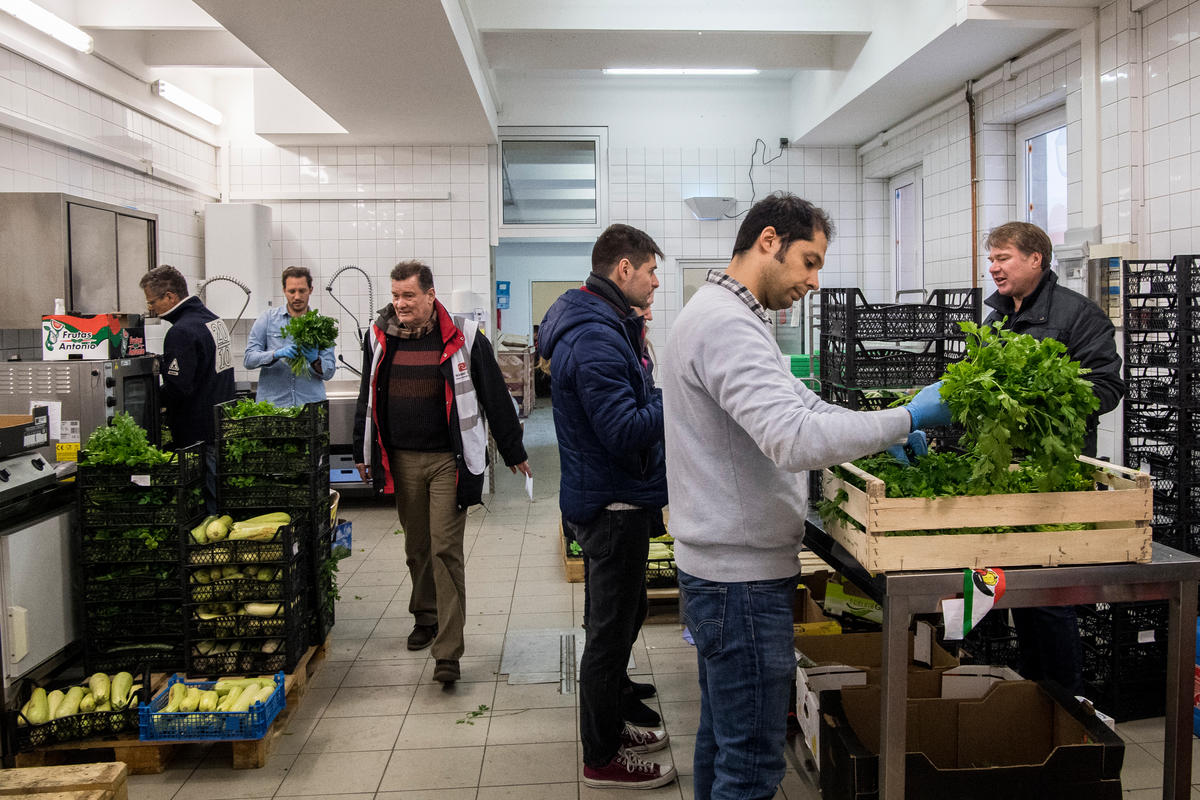Austria. Refugees in Austria help to feed those poorer than themselves