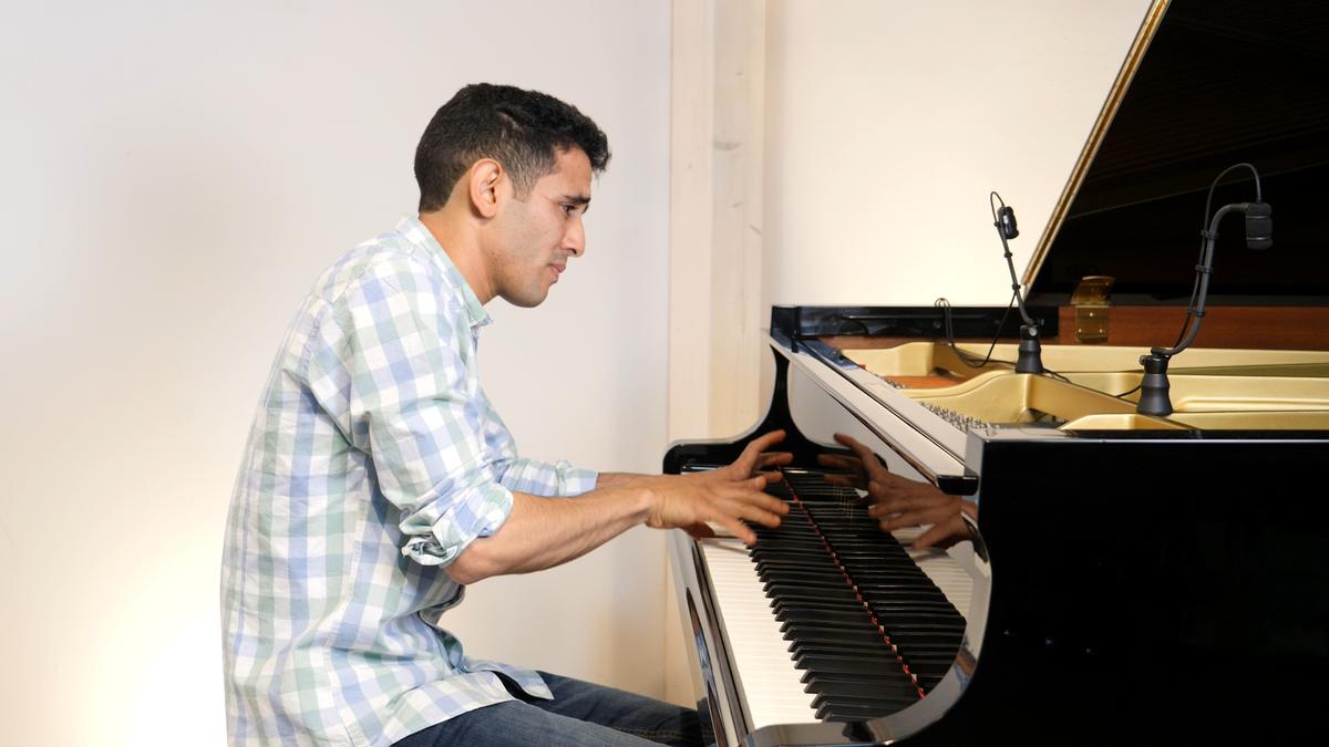 Aeham Ahmad, the &amp;quot;Pianist of Yarmouk,&amp;quot; recording his Nansen performance in Kassel, Germany.