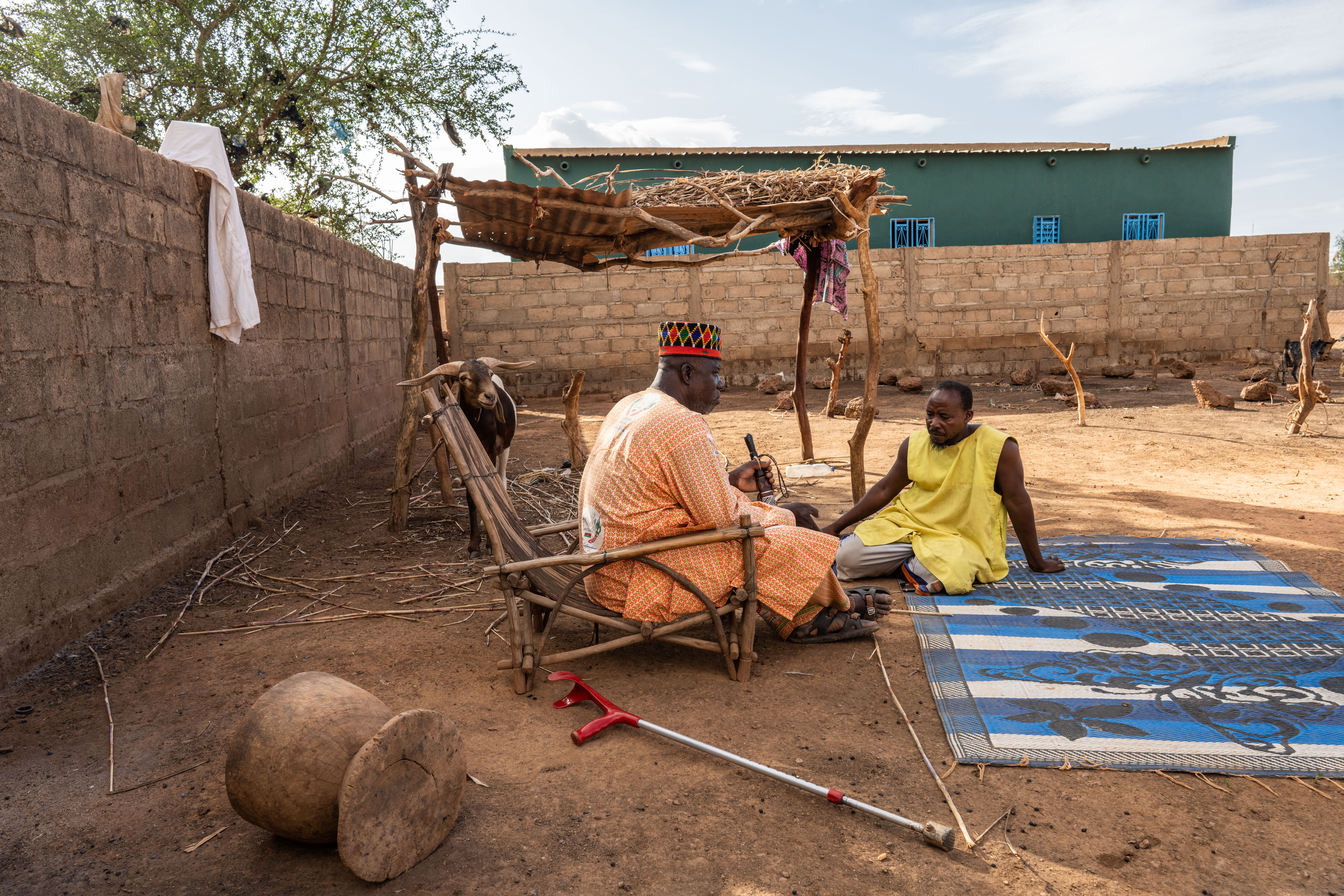 Burkina Faso. Chief Diambende Madiega and neighbor who agreed to help displaced