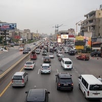 Three lanes of traffic head south out of Sidon, Lebanon.