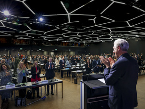 UN High Commissioner for Refugees, Filippo Grandi, stands and applauds during the closing session of the Global Refugee Forum. 