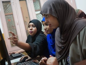 Young Somali refugees learn skills at the Sampushti Community Learning Centre in Delhi, building confidence through shared learning and peer support 