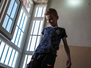 Iraq. Yazidi child gets ready to reunite with his mother in Canada